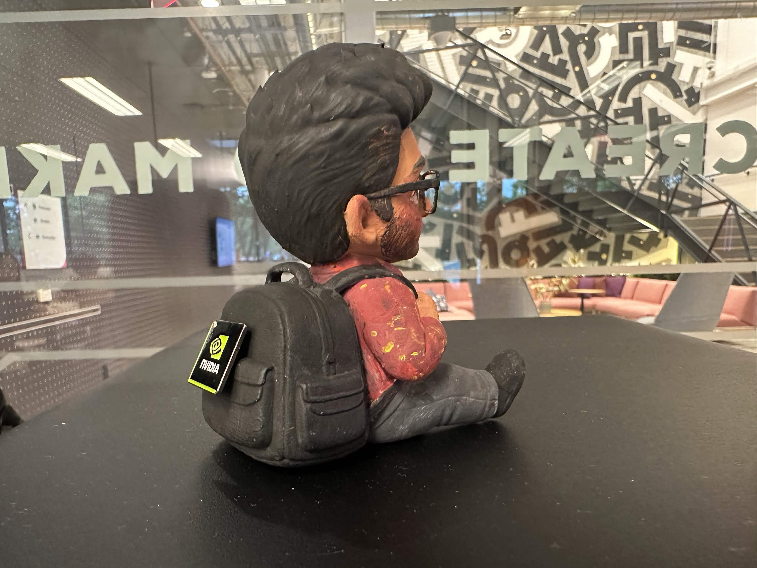 Back view of the finished figurine showing its backpack with an NVIDIA sticker